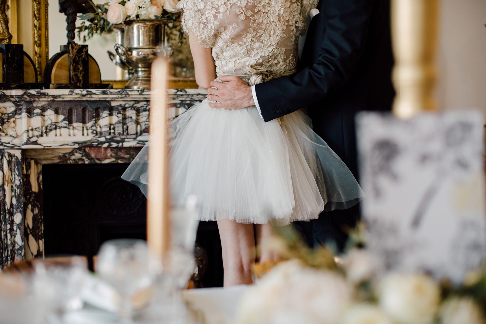 Intimate candlelit wedding table with fine details