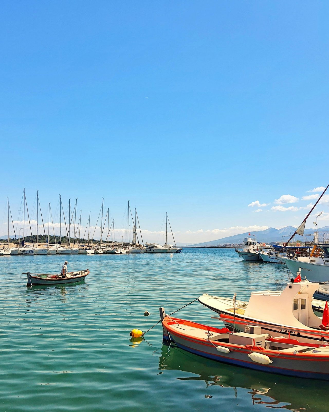 Çeşme marina — fishing boats, yachts, calm Aegean water