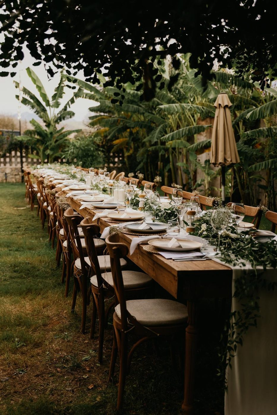 Table Setting 101 — long garden table, greenery runner